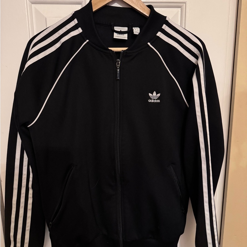 Adidas Women’s size medium Black Track Jacket with White Stripes